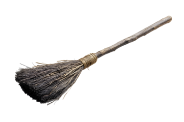 Old wicked witches broomstick isolated on white background