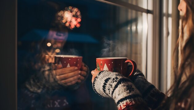 Cozy Holiday Vibes Woman Holding Hot Drink by Window