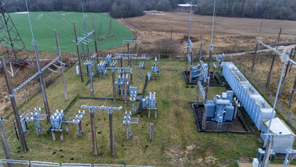 Rural Electrical Substation Landscape with Power Lines and Open Fields