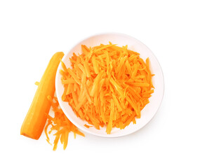 Top view of a white bowl with grated fresh carrots and a whole peeled carrot isolated on white background.