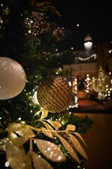 Close-up of Christmas Tree with Golden Ornaments