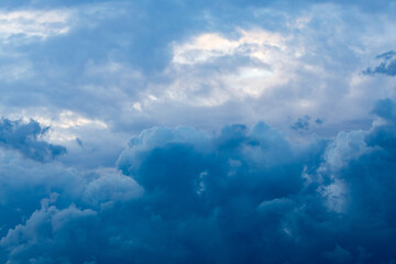 Dark blue clouds are gathering in the sky.