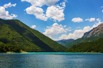 Scenic landscape photo of Piva Lake in Montenegro, Europe