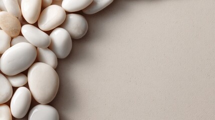 Smooth White Pebbles Forming a Corner on a Soft Beige Background Creating an Elegant Natural Composition for Aesthetic Interior Design