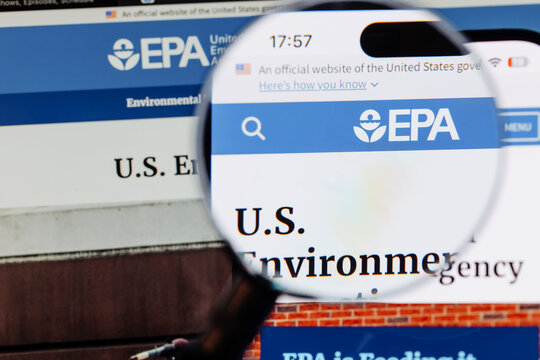 U.S. Environmental Protection Agency website displayed on a computer screen, showcasing environmental initiatives and policies with a magnifying glass effect