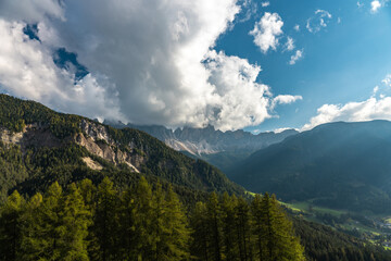 Fototapeta premium Breathtaking Landscape of the Alps, Italy with Majestic Mountains and Lush Forests