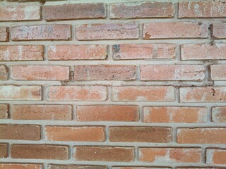 Grunge red brick wall background.