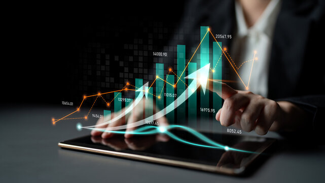 A professional image illustrating financial growth through rising graphs and analytics on a tablet, symbolizing effective investment strategies and business success. Scalp - Powered by Adobe