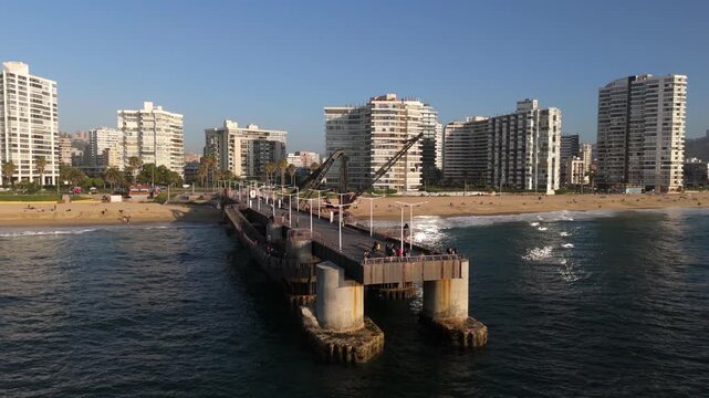 Close-Up Drone View of Muelle Vergara Crane at Sunset