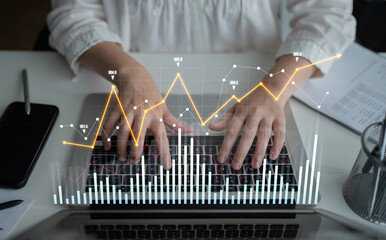A close-up of hands typing on a laptop keyboard, featuring digital graphs and charts that represent data analysis, business growth, and technological insights. Scalp