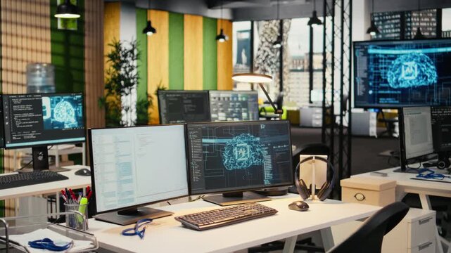 PCs on office desk used to design and implement algorithms enabling deep learning. Artificial intelligence technology company workspace with computers used to conduct code reviews to fix bugs