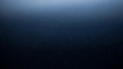 Abstract Dark Blue Background with Floating Dust Particles