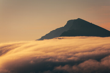 mist in the mountains at sunset
