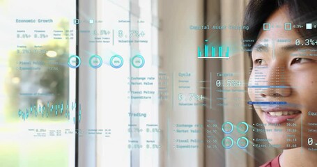 Teenage boy standing at window watching overlays appearing and studying finance HUD updating growth