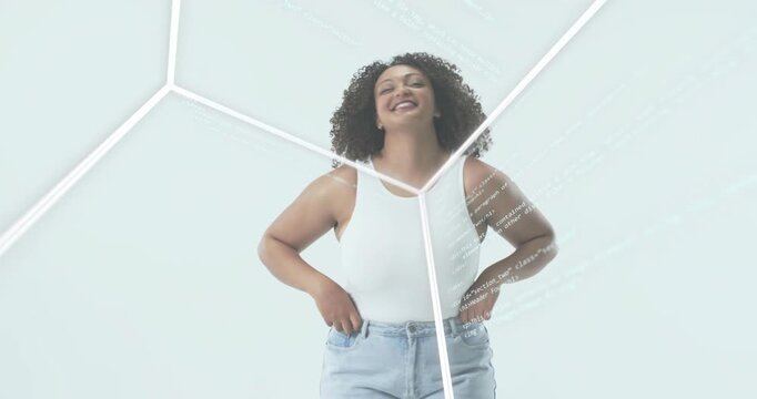 Woman posing in white cube while rotating wireframe projecting code on torso, modeling tech ad