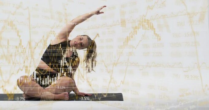 Woman doing seated side-bend on black mat with line charts % labels appearing for finance balance