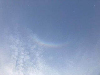 Obraz premium Delicate atmospheric halo above soft clouds