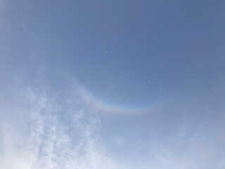 Obraz premium Delicate atmospheric halo above soft clouds