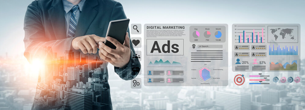 A businessman interacts with a smartphone amid digital marketing graphics and analytics, illustrating the intersection of technology and modern advertising strategies. Gantry