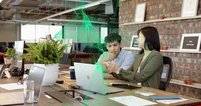 Woman gesturing stylus, man leaning studying tablet while green overlay appearing for design review