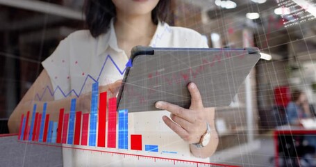 Woman tapping tablet and manipulating animated bar charts and line graph for business data analysis - Powered by Adobe