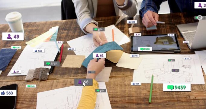 Designer grabbing teal swatch, passing as team comparing sketches, tablet overlays, checking color