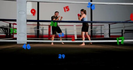 Man probing jabs, woman guarding and evading, boxers sparring in ring, overlays tagging strikes