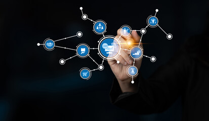 A professional hand interacts with a glowing digital interface featuring various icons that symbolize technology and data connections in a modern business context. Tessel