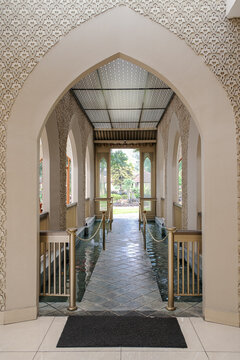 Traditional Islamic Archway Corridor with Ornate Walls and Pool. Sinbad, West Java. December 2nd, 2025.