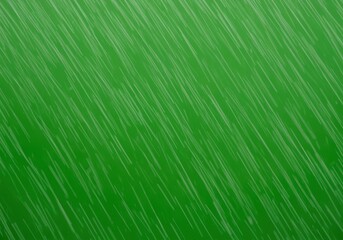 An abstract image featuring a vibrant green background with diagonal white lines, resembling rainfall.