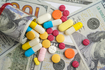 Pills on money dollars, Medicine prescription drugs cost concept, healthcare expenses