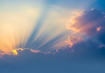 Radiant sky scene with sunbeams and soft pastel colored clouds