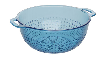 Two decorative blue ceramic colanders with patterned holes stacked for kitchen use