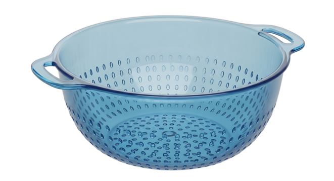 Two decorative blue ceramic colanders with patterned holes stacked for kitchen use