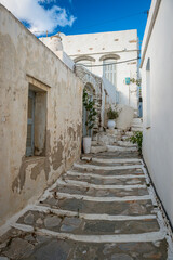 Typical traditional narrow alleyway of a whitewashed greek sugar cube village of Apollonia on the greek island of Sifnos