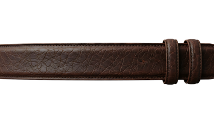 Close up of a rich textured brown leather belt with a metal buckle against a dark background