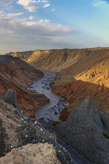 Aerial view of canyon landscape with river valley scenic overlook and beautiful sky and mountains