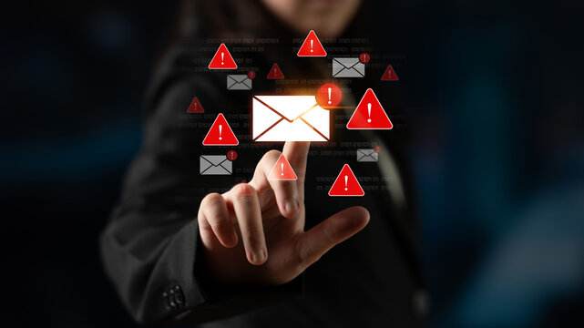 Concept of a cybersecurity warning for unsafe email communication. This alert signifies a phishing attack, spam, or malware risk that requires immediate attention to prevent fraud. Fermion - Powered by Adobe