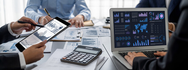 Business intelligence and data analysis concept. Analyst team working on financial data analysis...