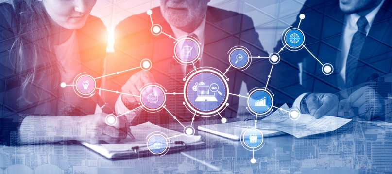 Captured in a corporate meeting, this image showcases business professionals collaborating on strategy development with digital tools and data visualizations for effective decision-making. Tessel