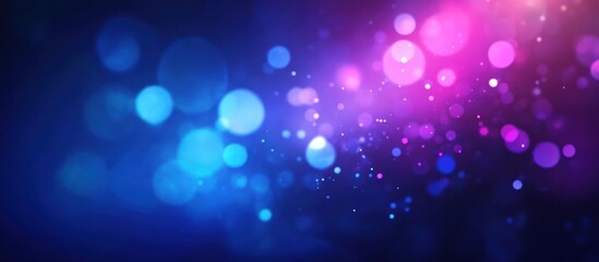 Abstract bokeh background with vibrant blue and purple hues creating a magical atmosphere