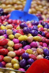 Colorful variety of olives at a market in the afternoon
