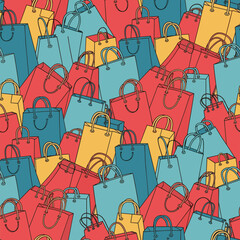 Seamless pattern featuring a vibrant mix of overlapping red, blue, and yellow shopping bags, perfect for retail and commerce themes.