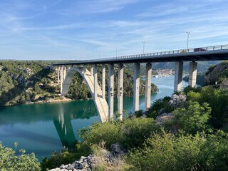 Krka Bridge on the A1 motorway or reinforced concrete arch bridge over the Krka River near Skradin, Croatia - Most Krka na autoputu A1 ili armiranobetonski lučni most preko rijeke Krke, Hrvatska