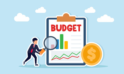 Businessman using a magnifying glass to observe a budget document with charts and a dollar coin illustrating business budget monitoring and analysis