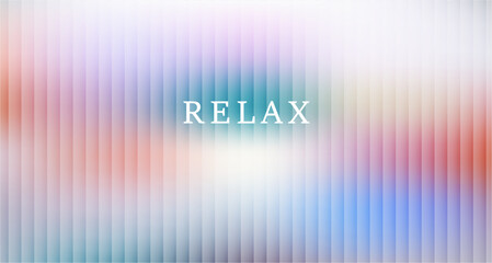 Softly blurred background in pastel colors with the word RELAX at the center