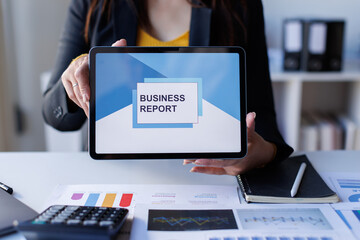 Analyzing data dashboard, business analytics, financial chart, and performance graph on laptop, working at office desk with report, modern technology, and professional focus
