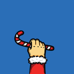 Festive Hand Holding Candy Cane With Red Sleeve Against Blue Background