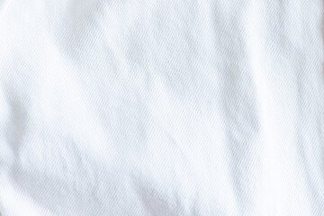 Close up of white fabric with subtle shadows and texture. Trendy color of 2026 year
