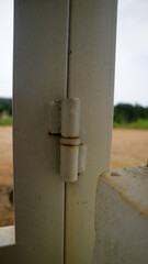 Rusty Metal Hinge on Door Frame